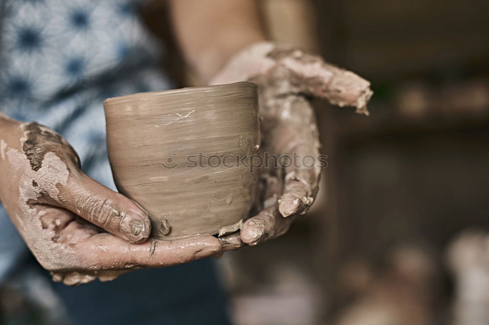 Similar – Image, Stock Photo Woman working with clay making pot