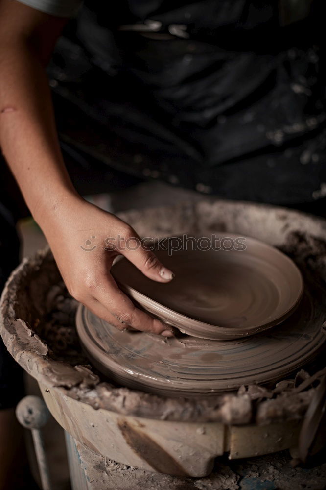 Similar – Image, Stock Photo Hands of a potter forming clay
