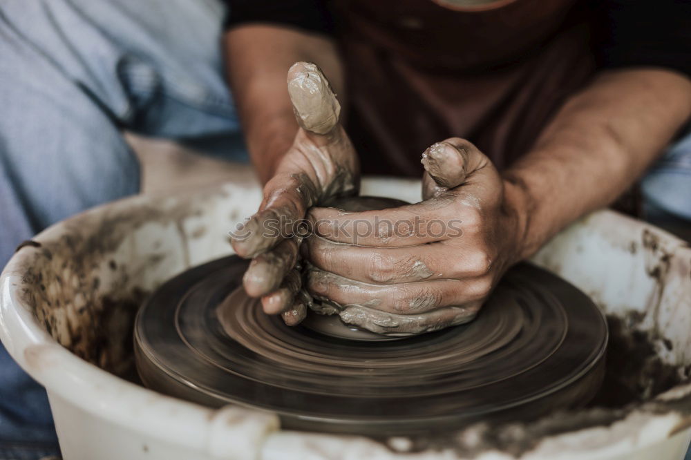 Similar – Image, Stock Photo Woman working with clay making pot