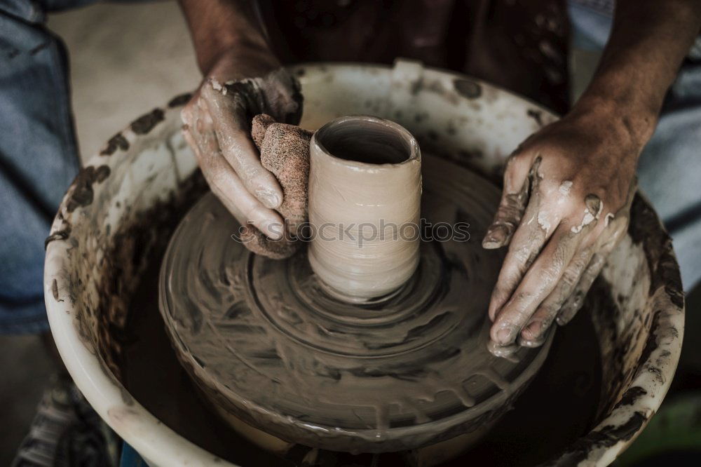 Image, Stock Photo Hands of a potter forming clay