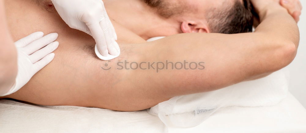 Similar – Image, Stock Photo Woman receiving back massage on clinical center