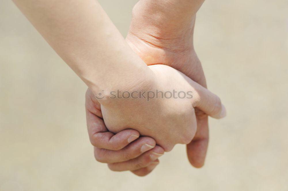 Similar – Child and senior man comparing his hands size