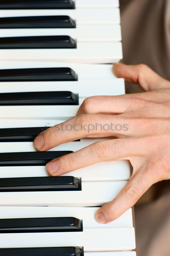 Similar – Image, Stock Photo Close up of hands of person playing piano