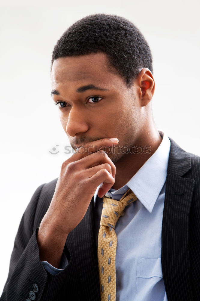 Confident attractive mulatto man in urban environment