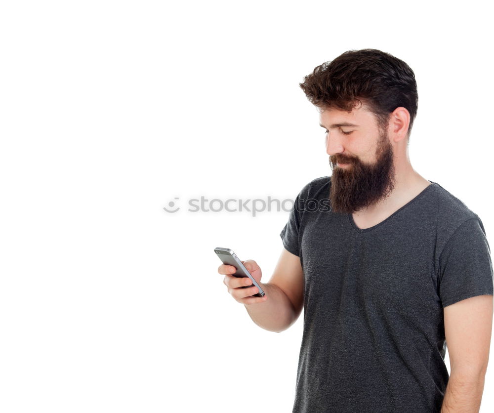 Similar – Man using his mobile phone.