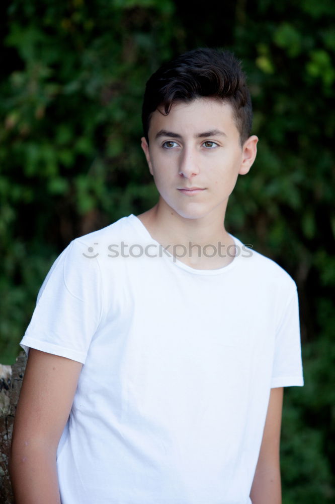 Similar – Attractive teenager guy in a park