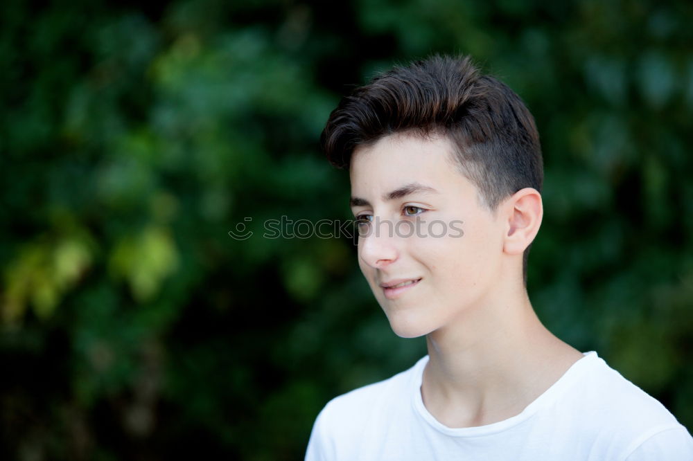 Similar – Attractive teenager guy in a park