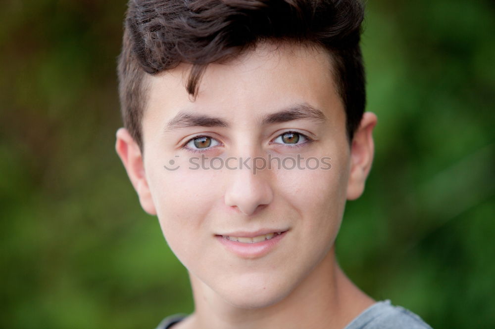 Similar – Image, Stock Photo Attractive teenager guy in a park