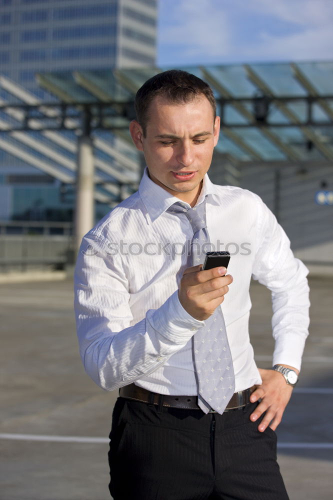 Image, Stock Photo Businessman Texting on his Phone in the Street