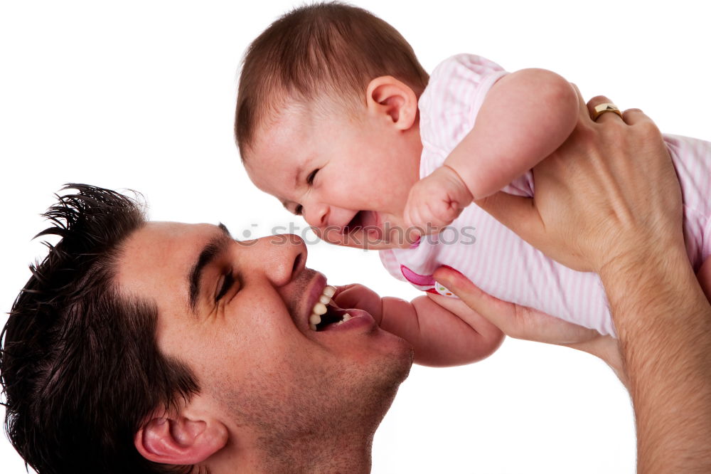 Similar – Daddy feeding toddler a spoonful of baby food