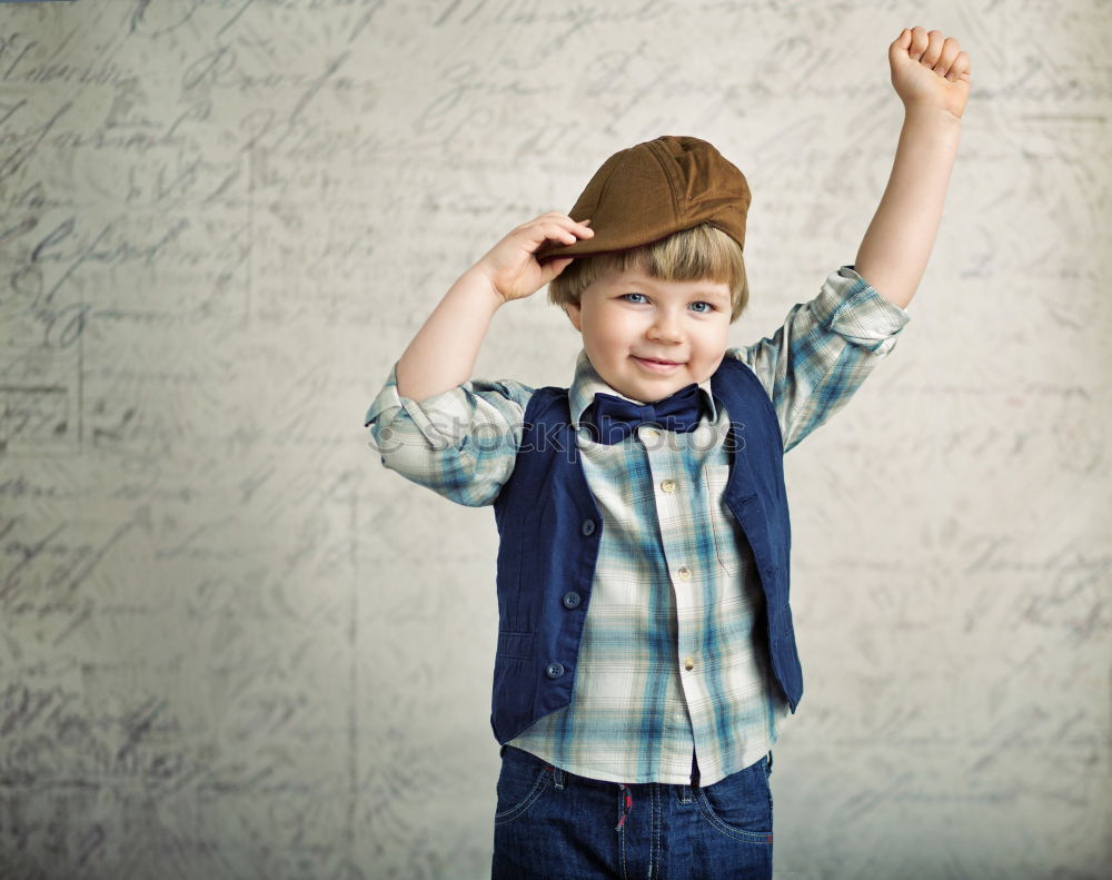 Similar – Image, Stock Photo smiling child holding a blackboard