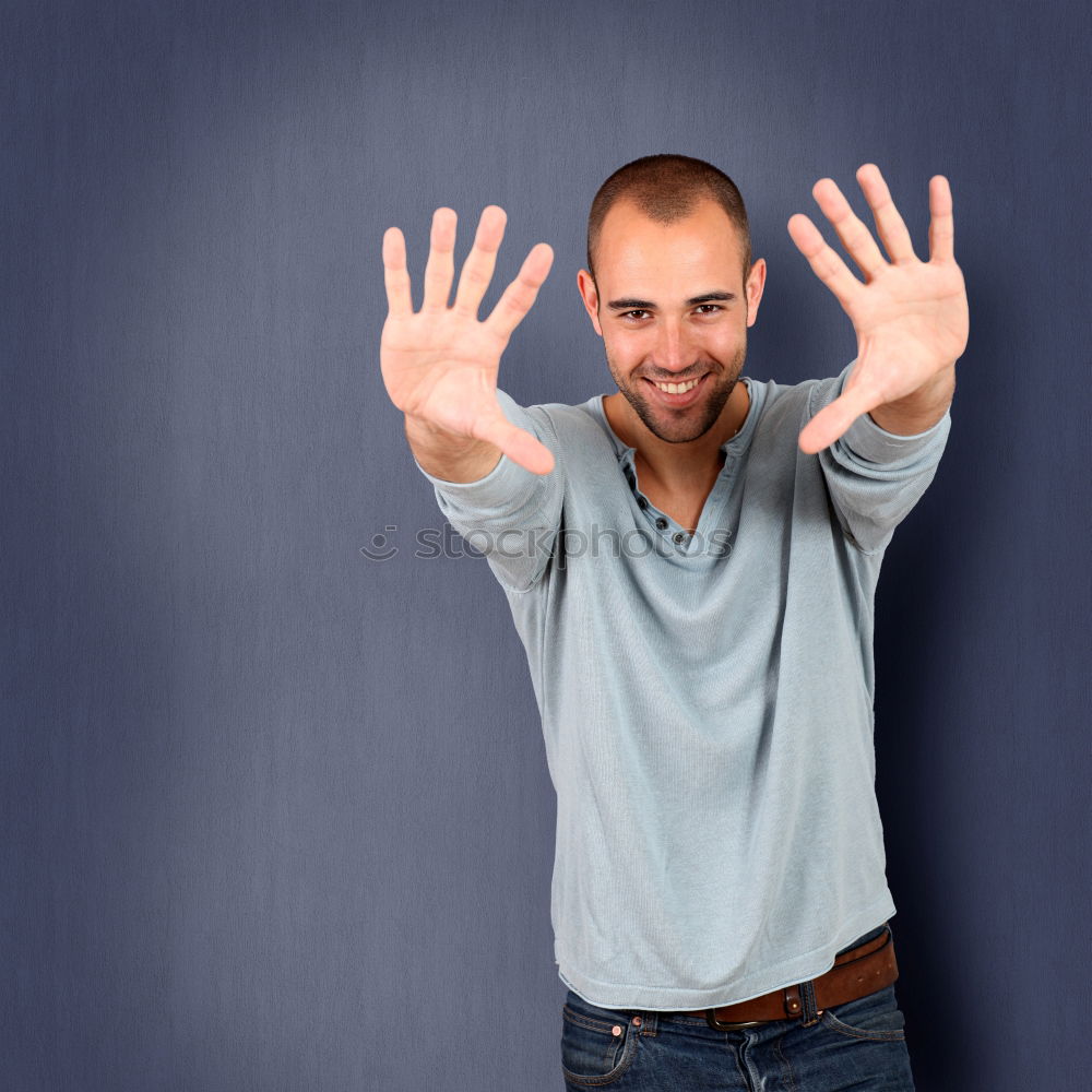 Similar – Image, Stock Photo Casual man showing biceps at street