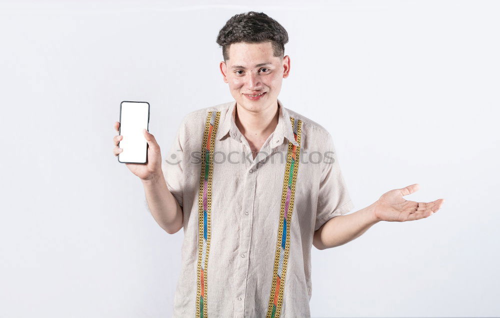 Similar – Business man with mobile phone in his hand