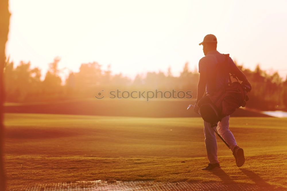 Similar – Golf: short game using a wedge iron club.