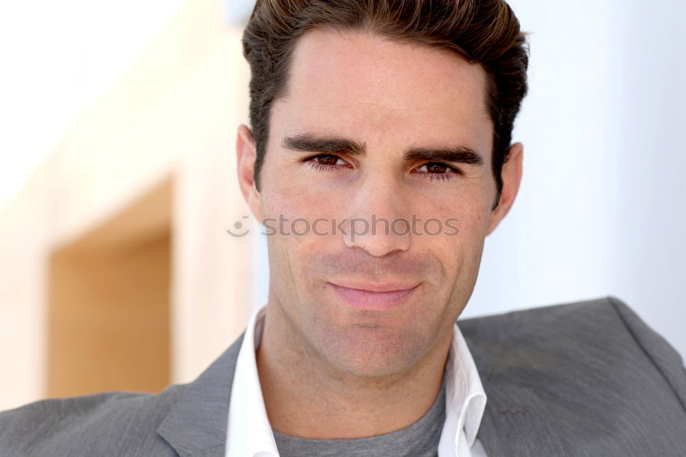 Similar – Businessman wearing blue suit and tie outdoors