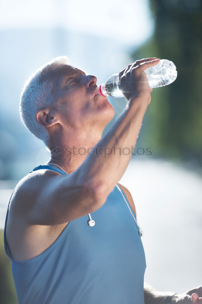 Similar – Image, Stock Photo Young black man drinking water before running outdoors