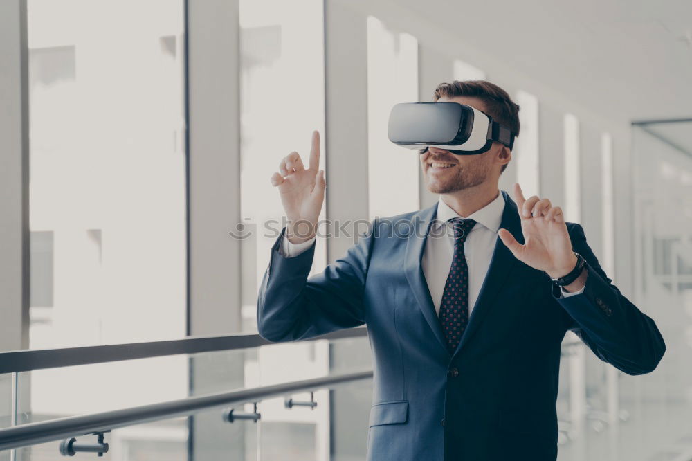 Similar – Image, Stock Photo afro businessman playing virtual reality simulation