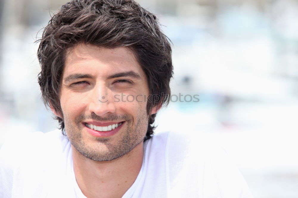 Similar – Young man smiling in urban background