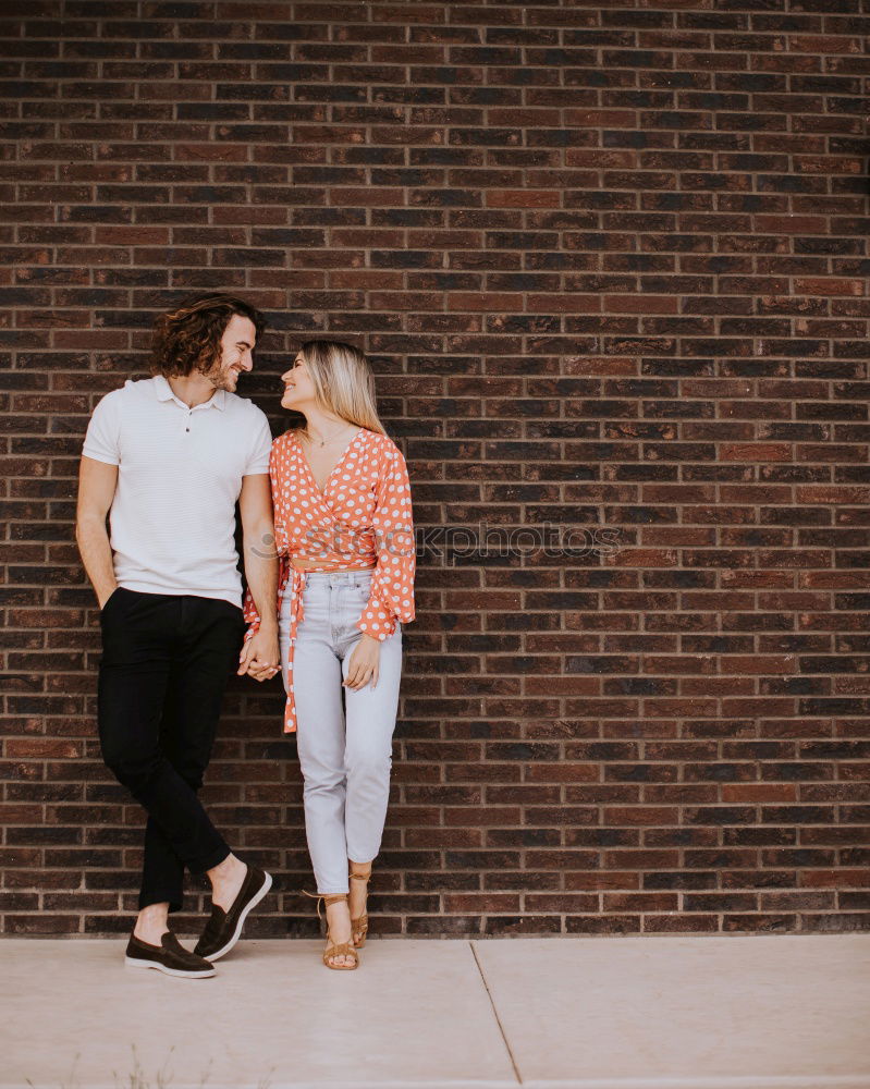 Similar – Image, Stock Photo Couple embracing on evening street