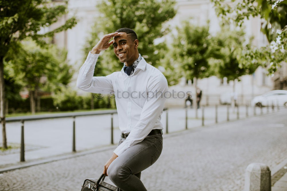 Image, Stock Photo Young black man wearing casual clothes jumping in urban background