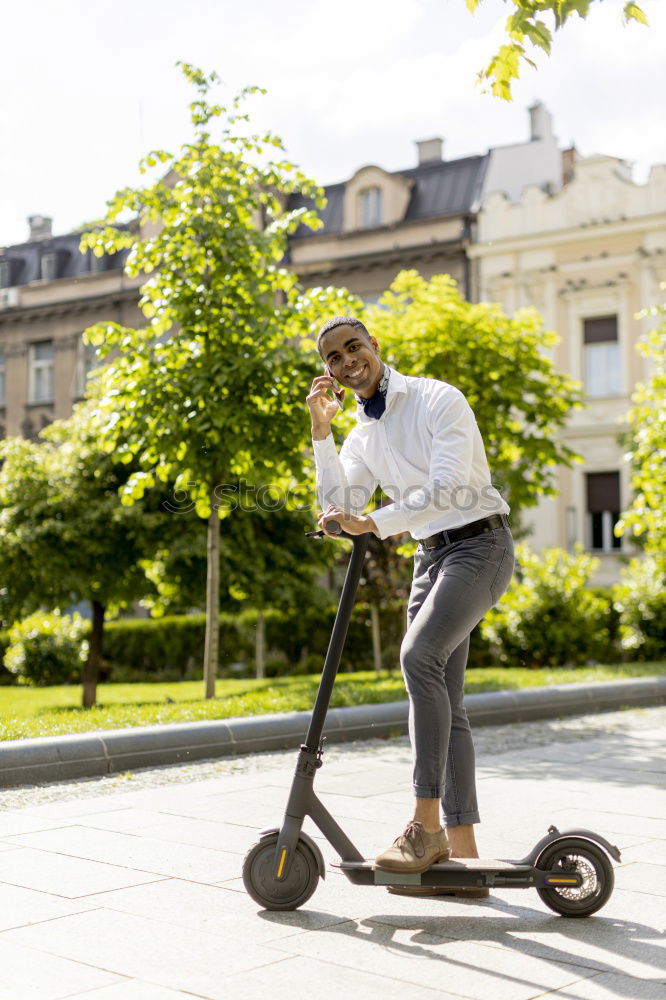 Similar – Foto Bild Frau mittleren Alters auf einem Elektroroller