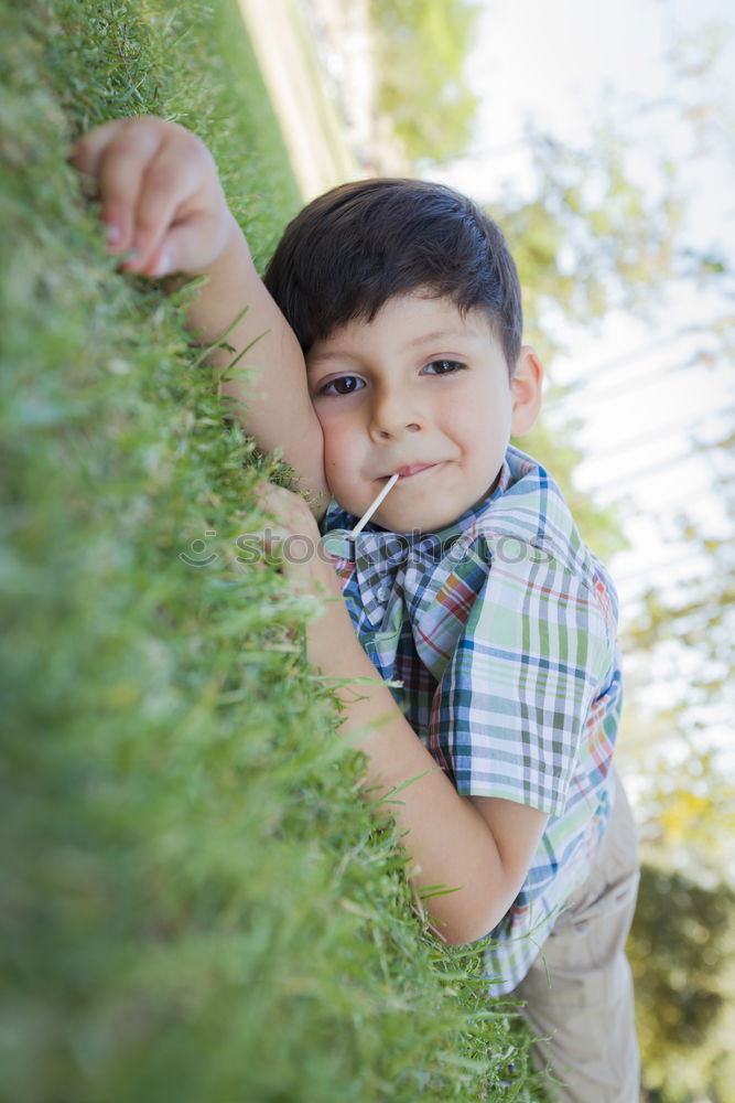 Similar – Cute child in the woods playing alone