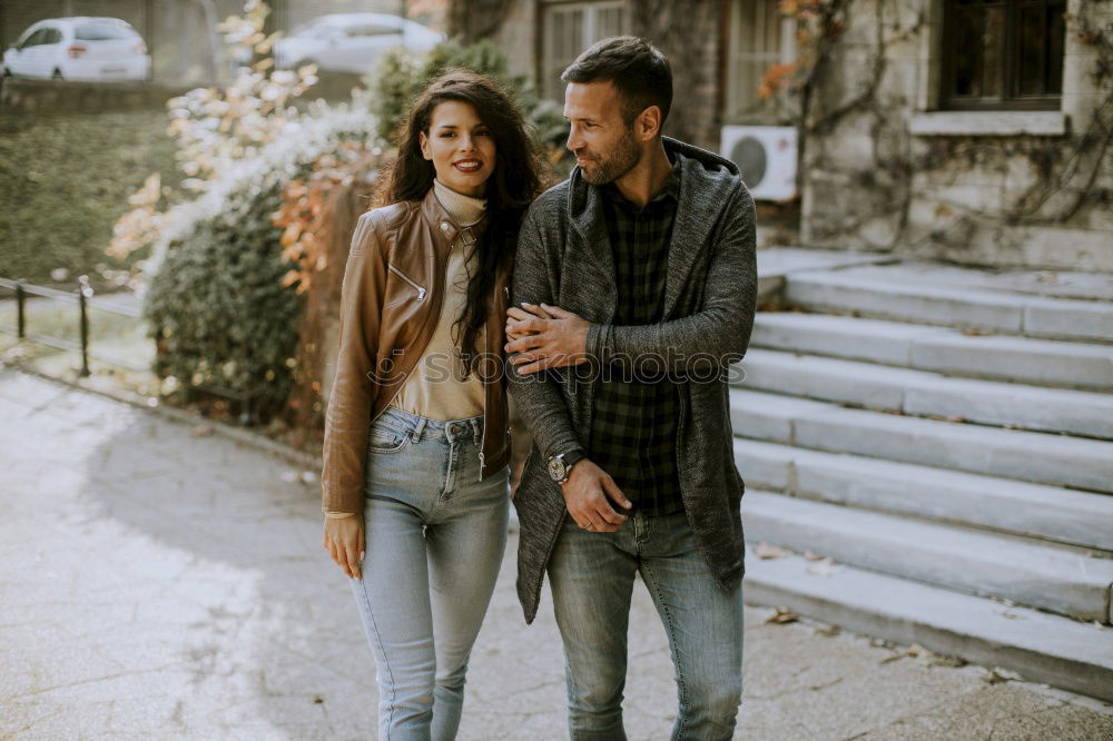 Similar – Couple standing at bus