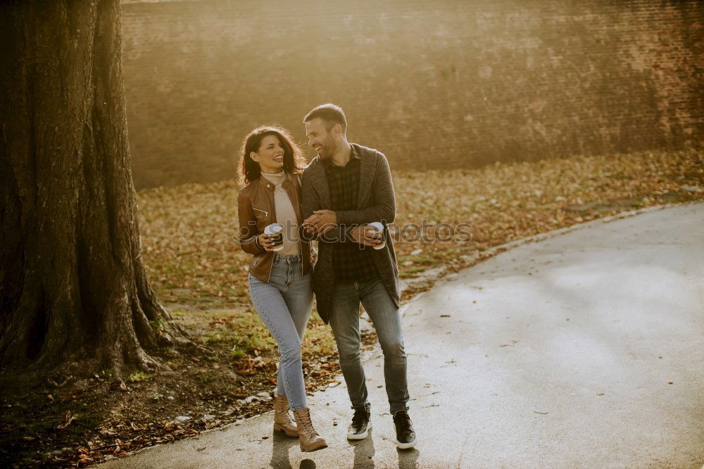 Similar – Elferly fit happy couple hiking through forest together on vacation