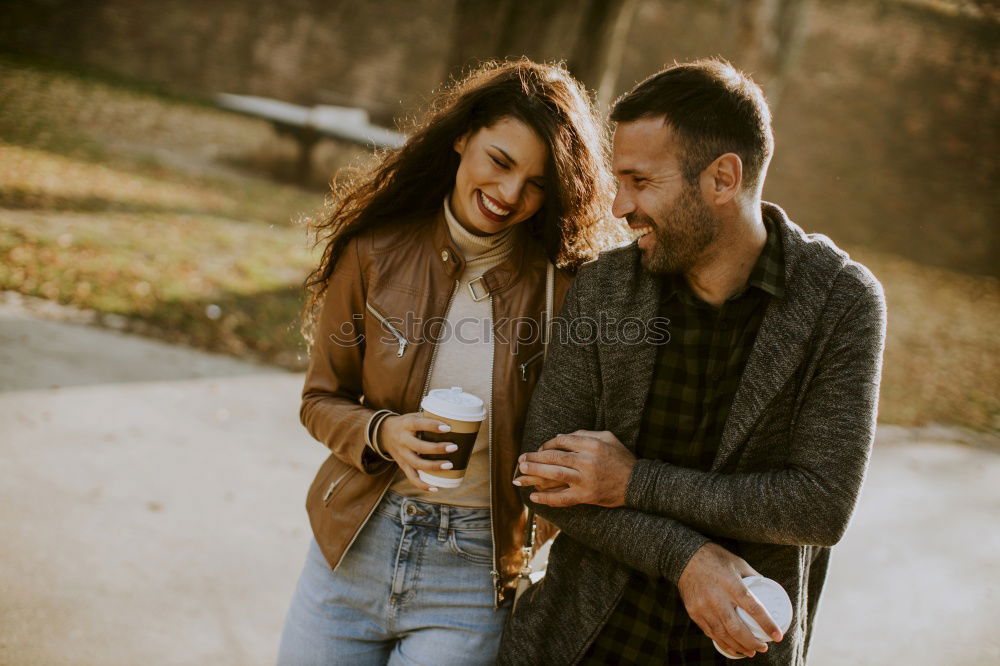 Similar – Blonde girl looks at camera while embraces her bearded boyfriend.