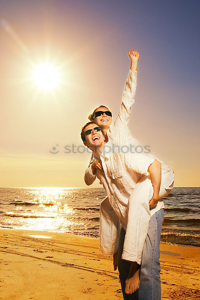 Similar – Image, Stock Photo Father and son playing on the beach at the sunset time.