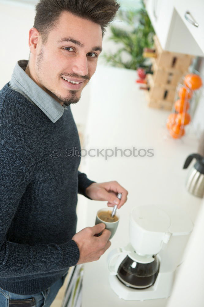 Similar – Hipster barista pours milk for making cappuccino or latte coffee in the cafe