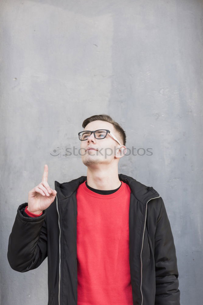 Similar – Image, Stock Photo Handsome man posing on orange wall