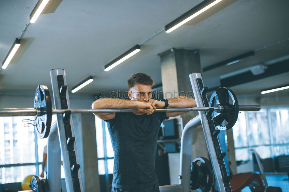 Image, Stock Photo Man setting control panel of treadmill for training