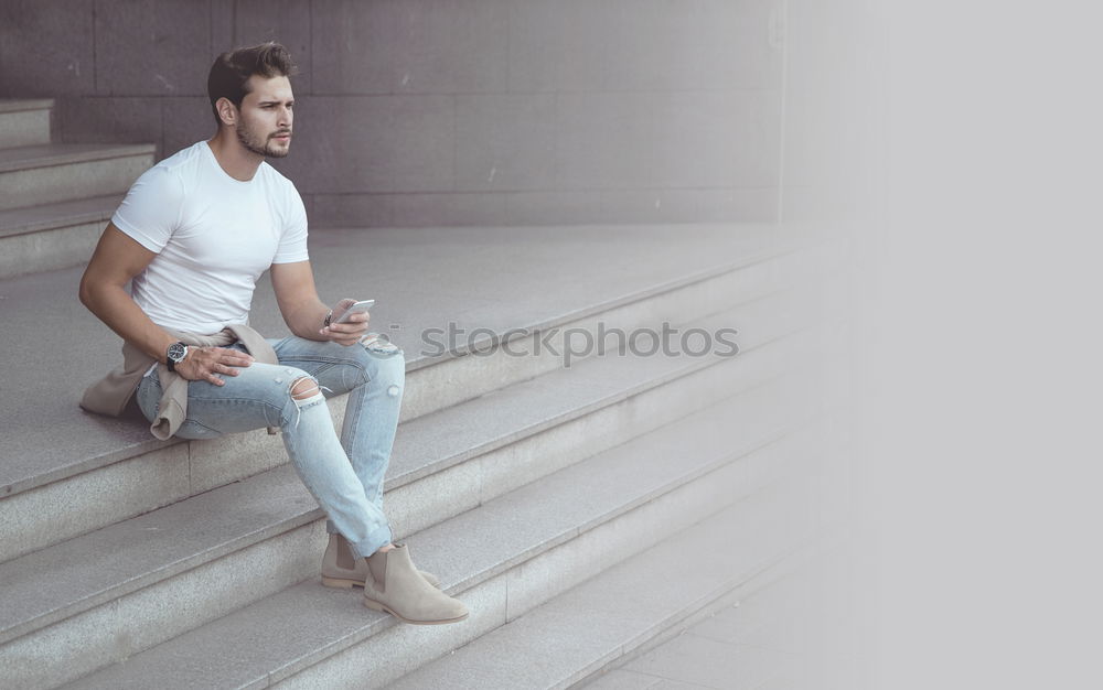 Similar – Image, Stock Photo Young handsome trendy man with coat posing with an old wall background