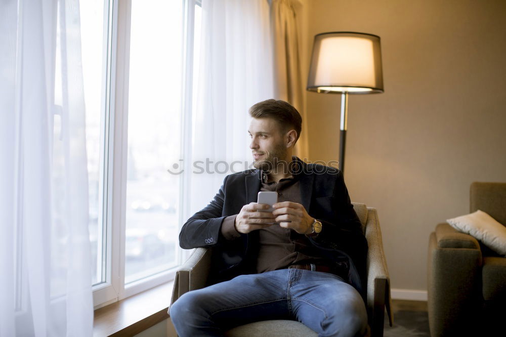 Similar – Image, Stock Photo man use remote control to watch tv