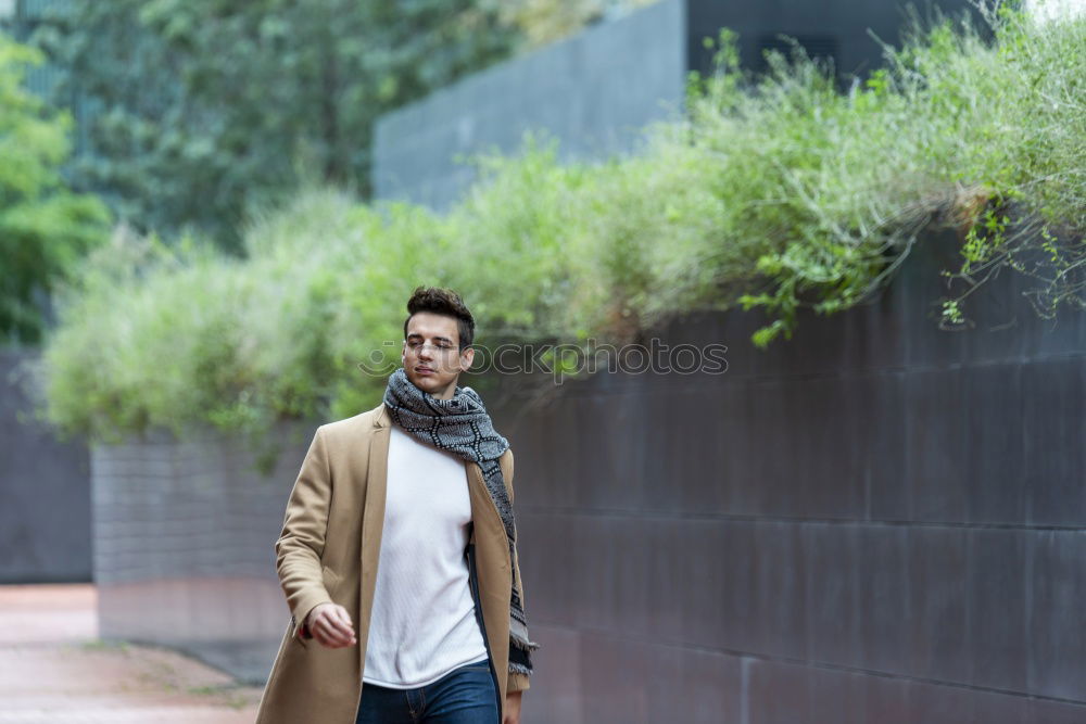 Similar – Afro young man using mobile phone and fixed gear bicycle.