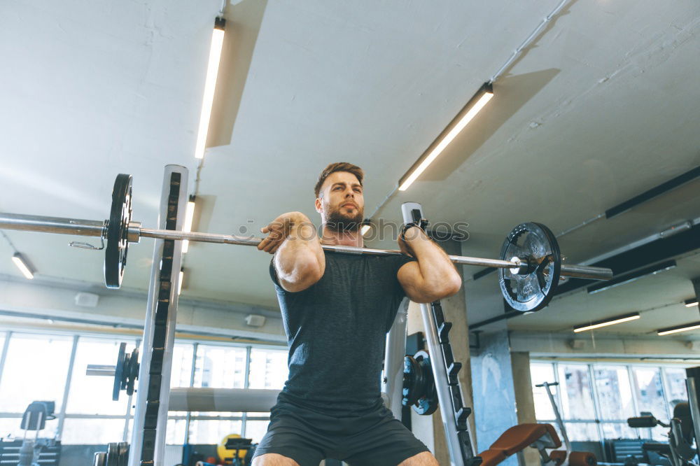 Similar – Image, Stock Photo Man setting control panel of treadmill for training