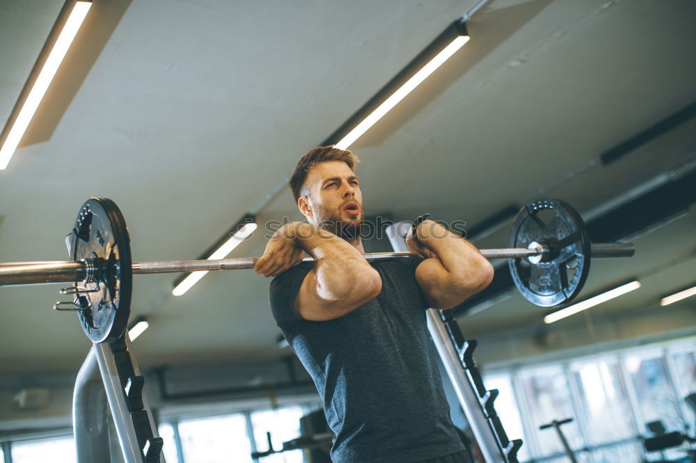 Similar – Image, Stock Photo Man setting control panel of treadmill for training