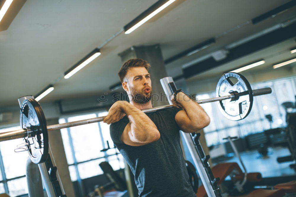 Similar – Image, Stock Photo Man setting control panel of treadmill for training