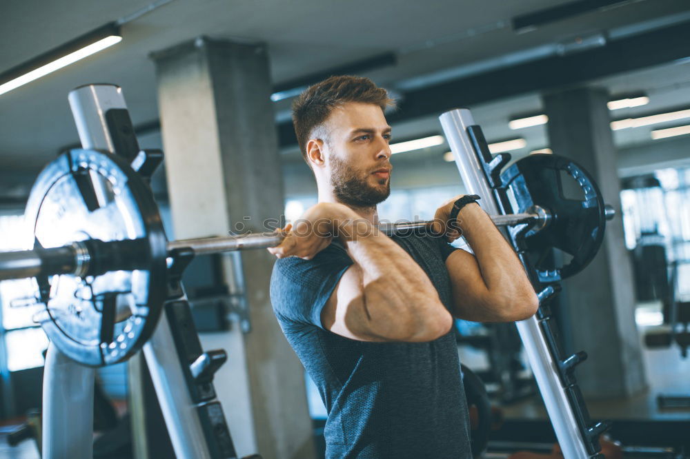 Similar – Image, Stock Photo Man setting control panel of treadmill for training