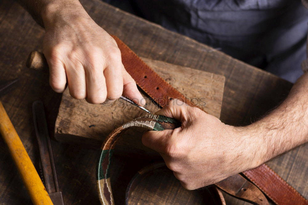 Similar – Hands making shoes