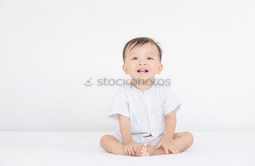 Similar – Close up face portrait little young asian boy