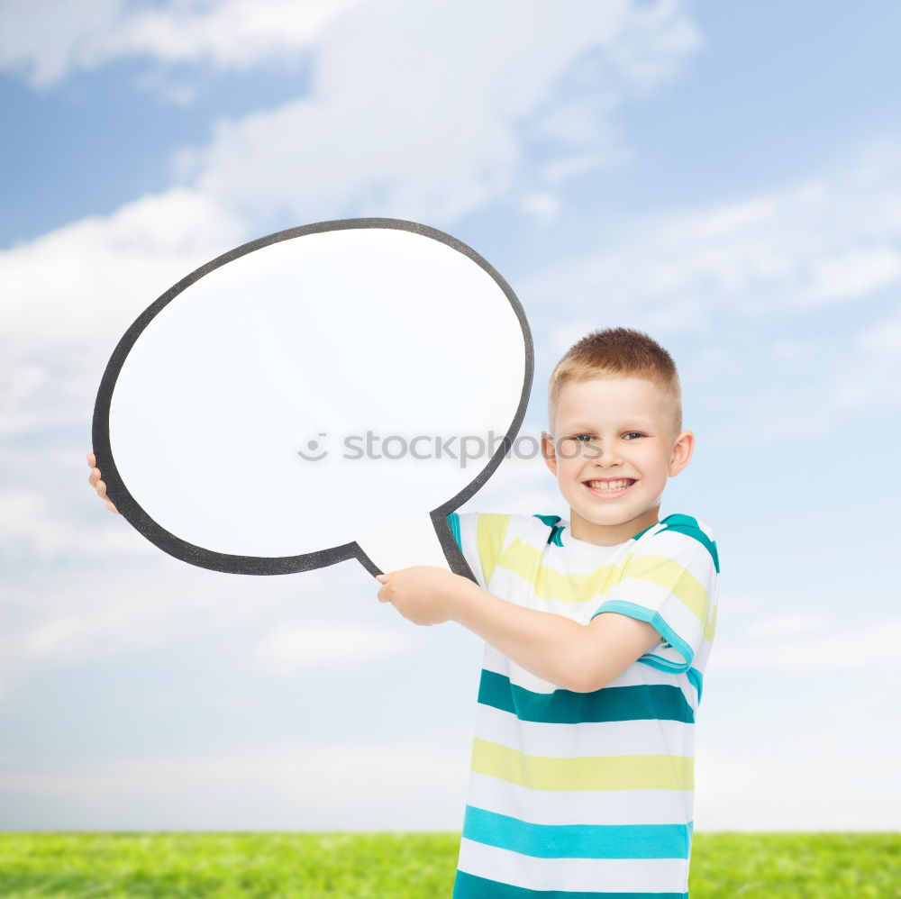 Similar – Image, Stock Photo Boy holding a sign on blue background