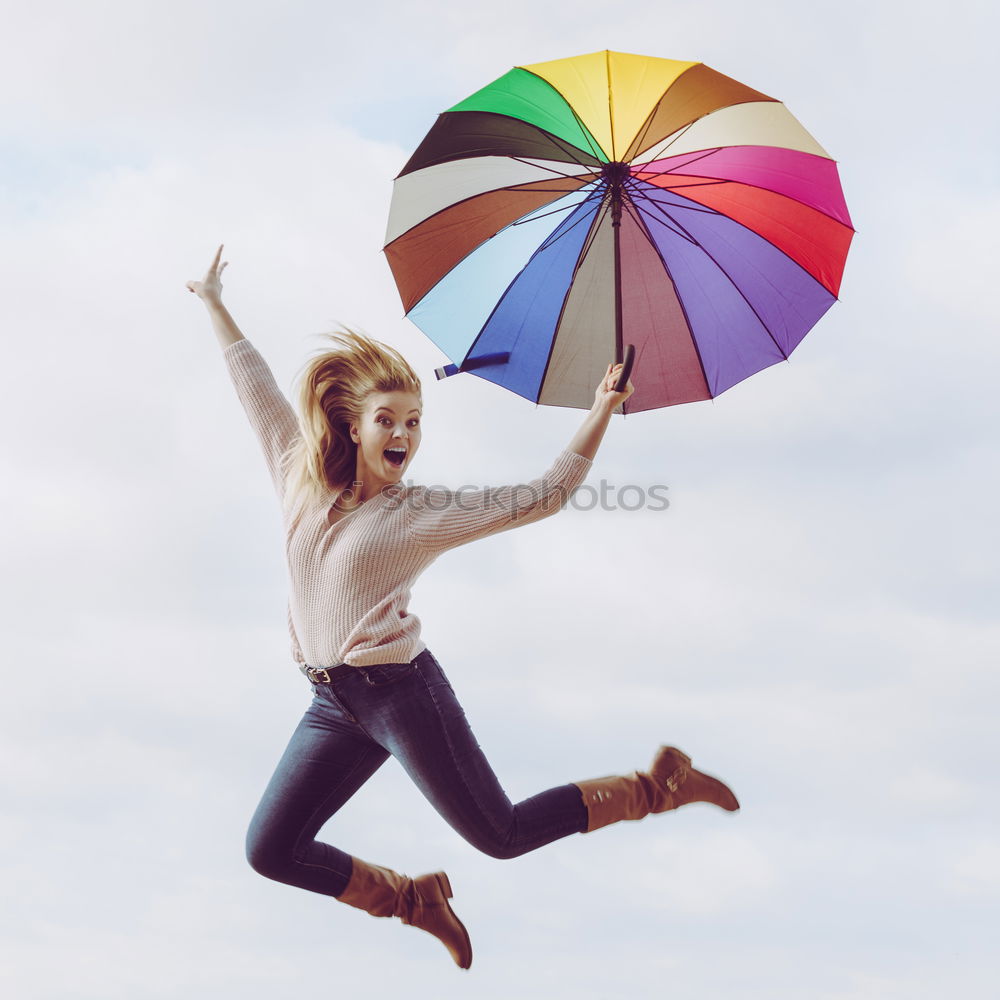 Similar – Image, Stock Photo A girl stretching arms and throwing Color powder