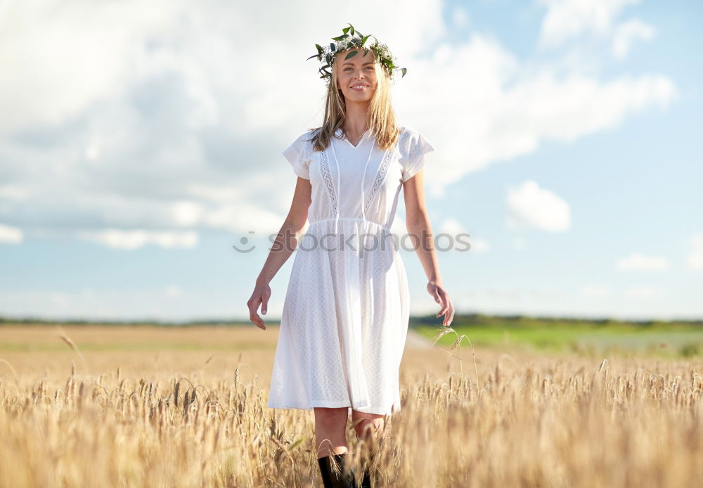 Similar – Image, Stock Photo Young woman walking in a path in the middle of a vineyard