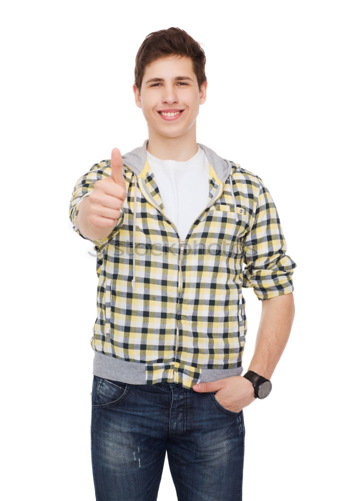 Similar – Young urban man using smartphone walking in street in an urban park