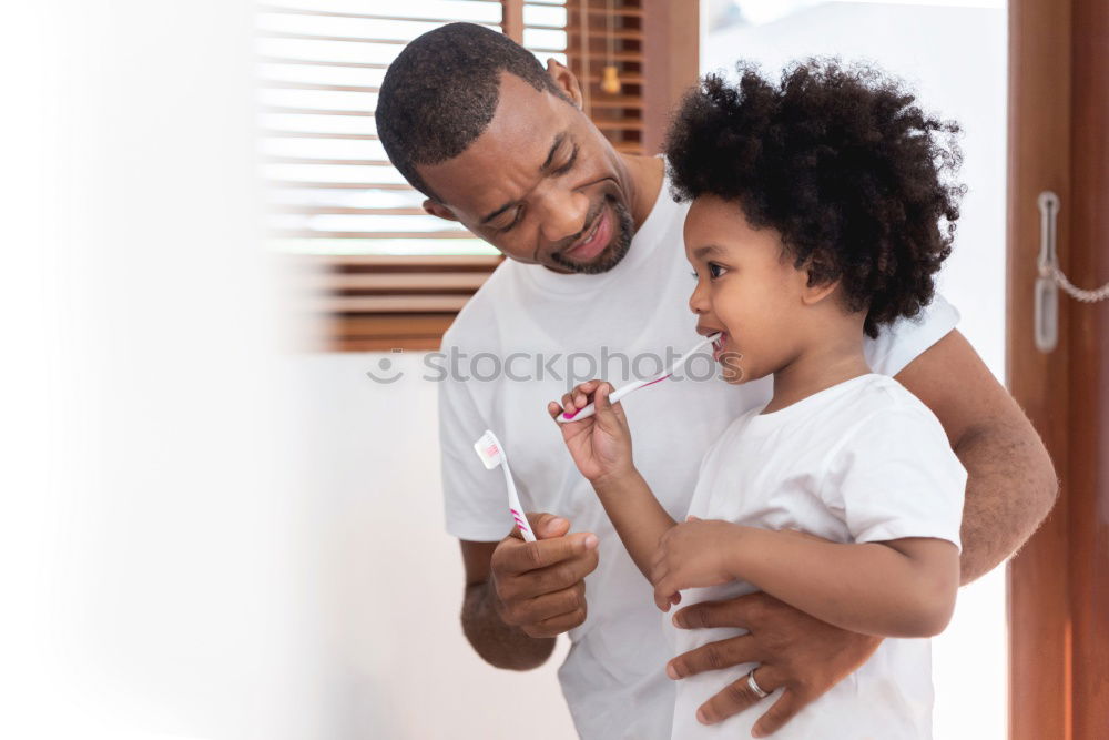 Similar – Portrait of African Father and toddler son