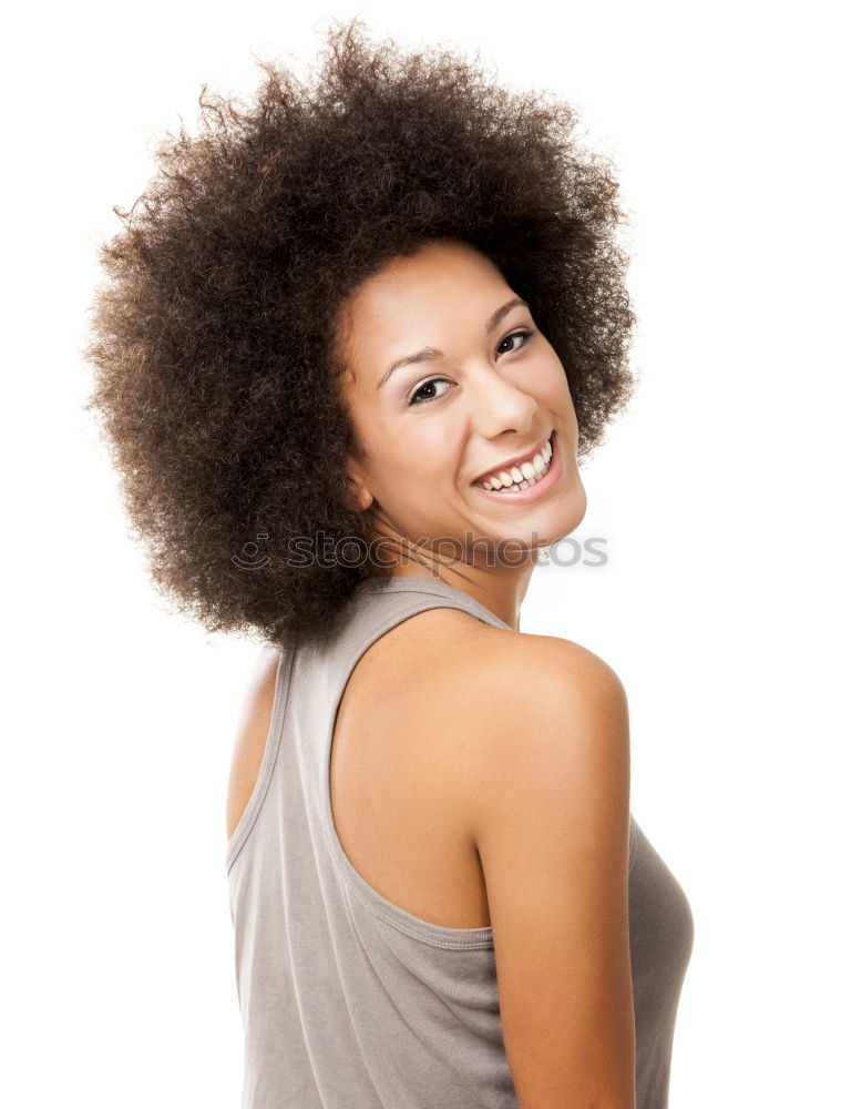 Similar – Young woman smiling with afro hairstyle and green eyes