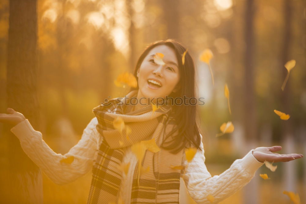 Similar – Black woman with afro hair celebrating with confetti.