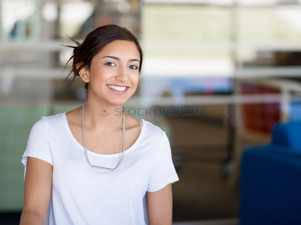 Similar – A young woman listening music on digital tablet sitting